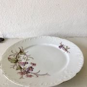 Assiette plate en porcelaine de Limoges