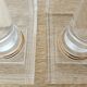 Pair of column bookends in plexiglass and gold metal, 1980s design.