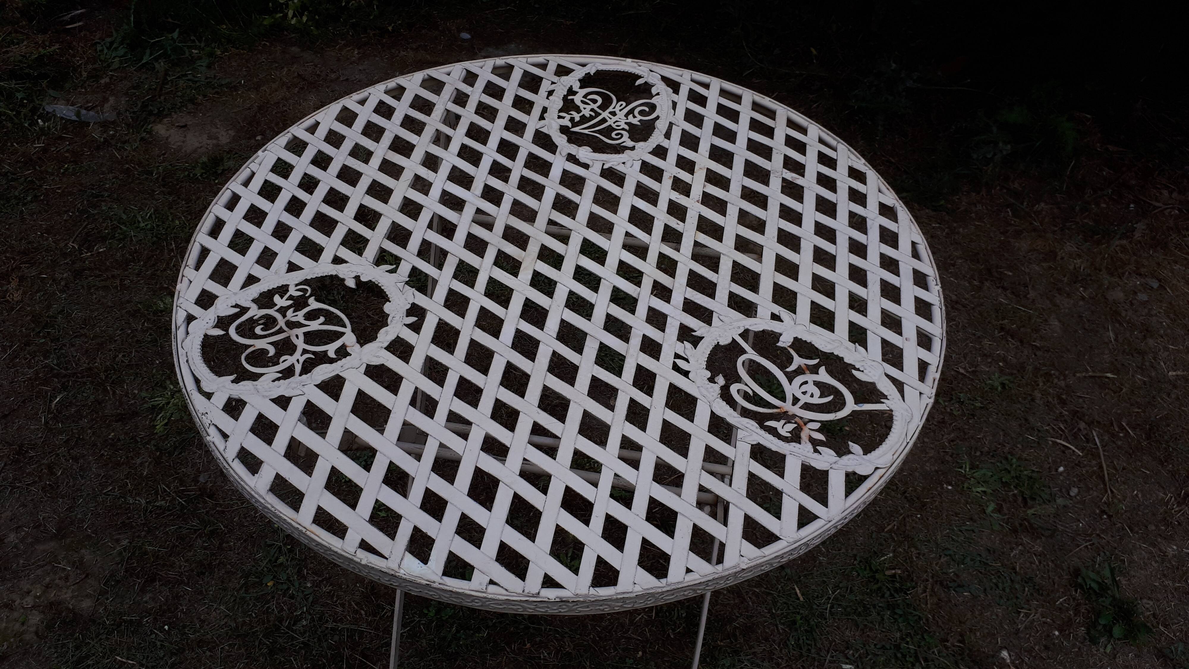 Folding garden table, wrought iron
