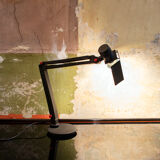 Desk lamp with metal frame and plastic details. Designer C.V.B. 80s