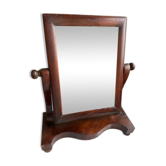 19th century rotating wooden mirror.