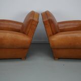 Pair of French club chairs with moustache back in cognac leather, 1950s