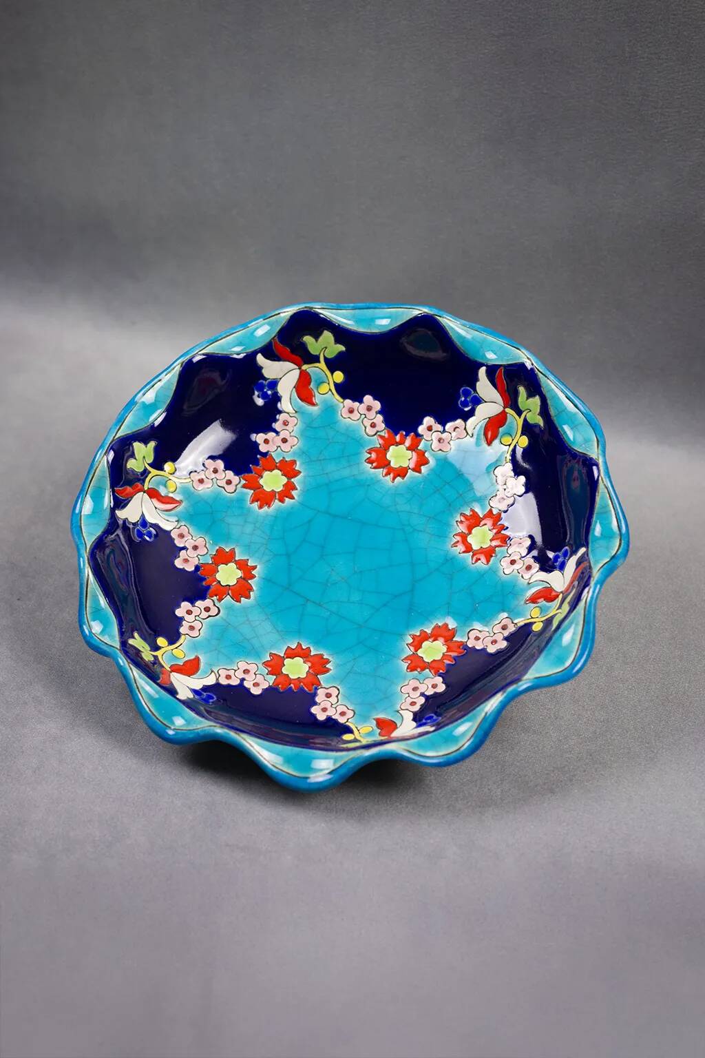 Longwy coupe model Roxane – Floral enamels on a crackled turquoise background