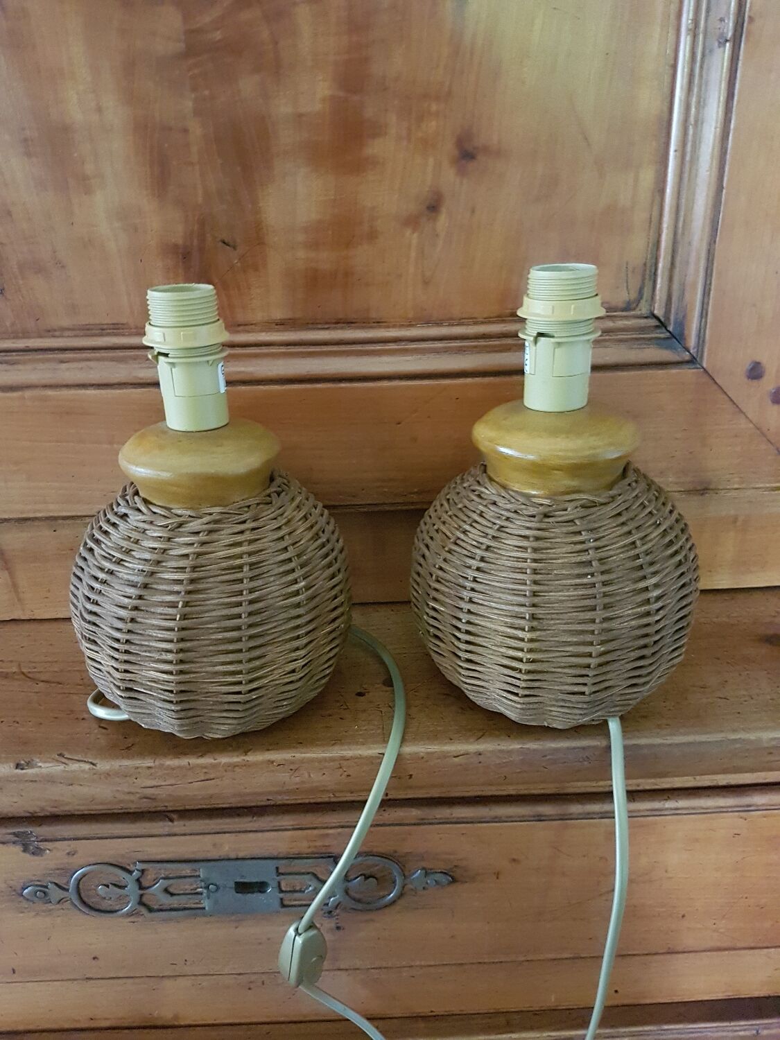 Pair of small ceramic lamps, dressed in rattan
