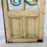 20th-century fir and painted glass under-stair door