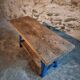 Vintage industrial workbench table with cast iron legs (Aux Forges de Vulcain)