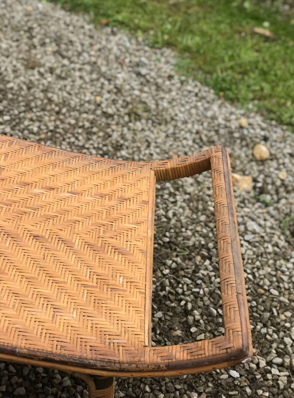 Old rattan lounger.