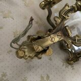 Wall lamp in Louis XV style in brass, shell decoration.