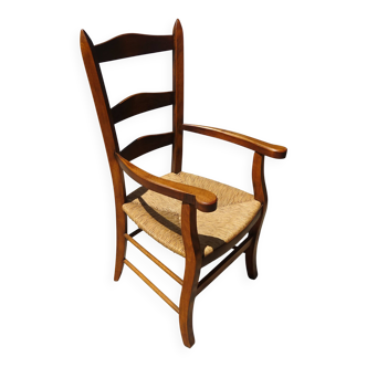 Traditional armchair made of wood and straw