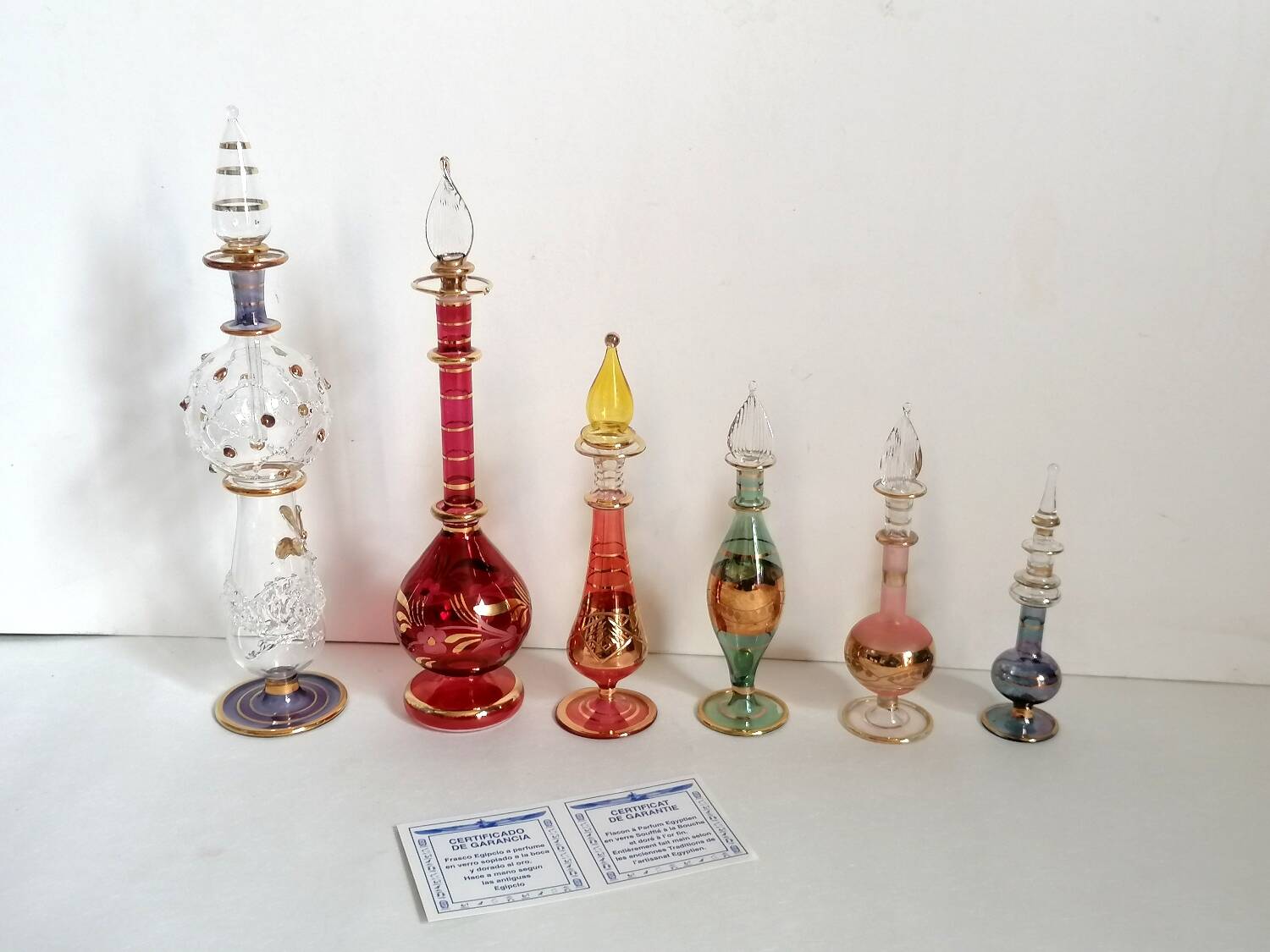 6 Egyptian gold and mouth-blown perfume bottles