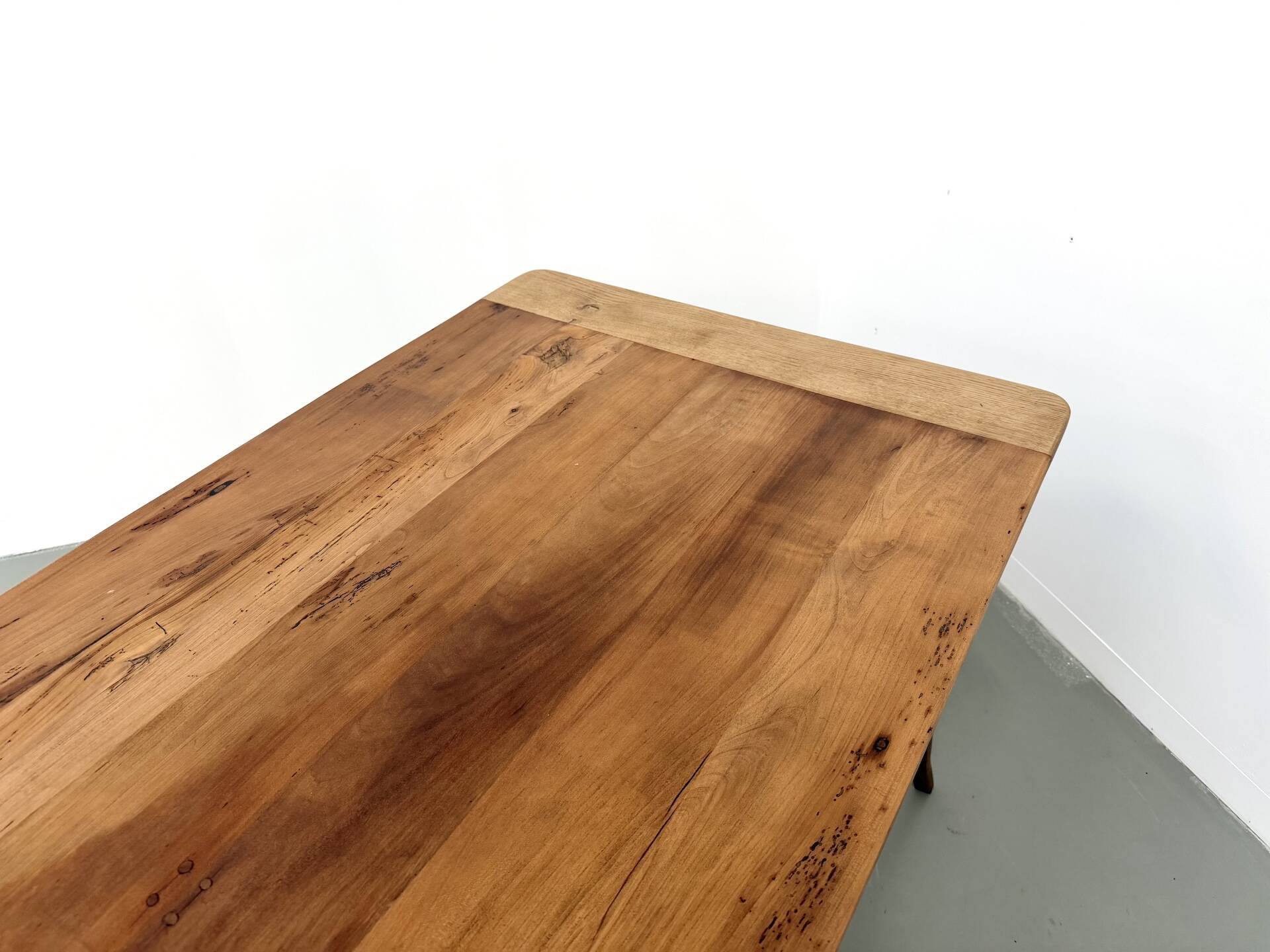 Farm table in solid cherry — Saber legs, Circa 1880