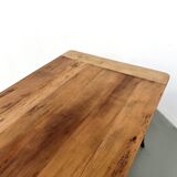 Farm table in solid cherry — Saber legs, Circa 1880