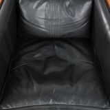 Set of 2 black leather Art Deco design armchairs in good condition