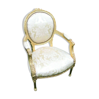 Fauteuil de style Louis XV tissu et  bois doré