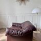 Brown leather armchair from the 1970s.