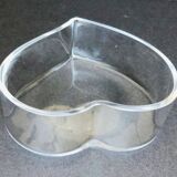 Empty glass heart-shaped pocket