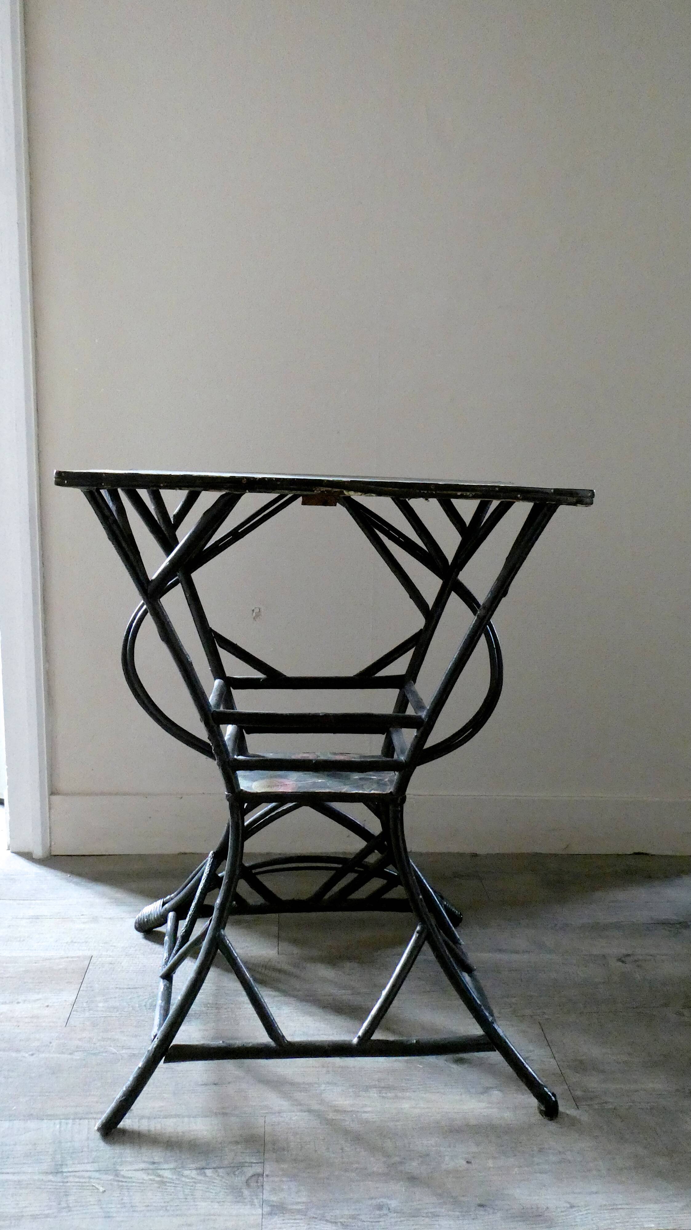 Side table, pedestal and blackened rattan, 1900 era