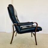 Vintage mid-century Scandinavian black leather lounge chair 1970s
