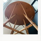 Round coffee table, in rattan and wood