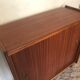 Vintage storage cabinet teak veneer sliding door compass feet