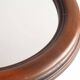 Oval mirror with wooden frame