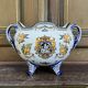Gien earthenware cache pot from the late 19th century with Renaissance decoration.
