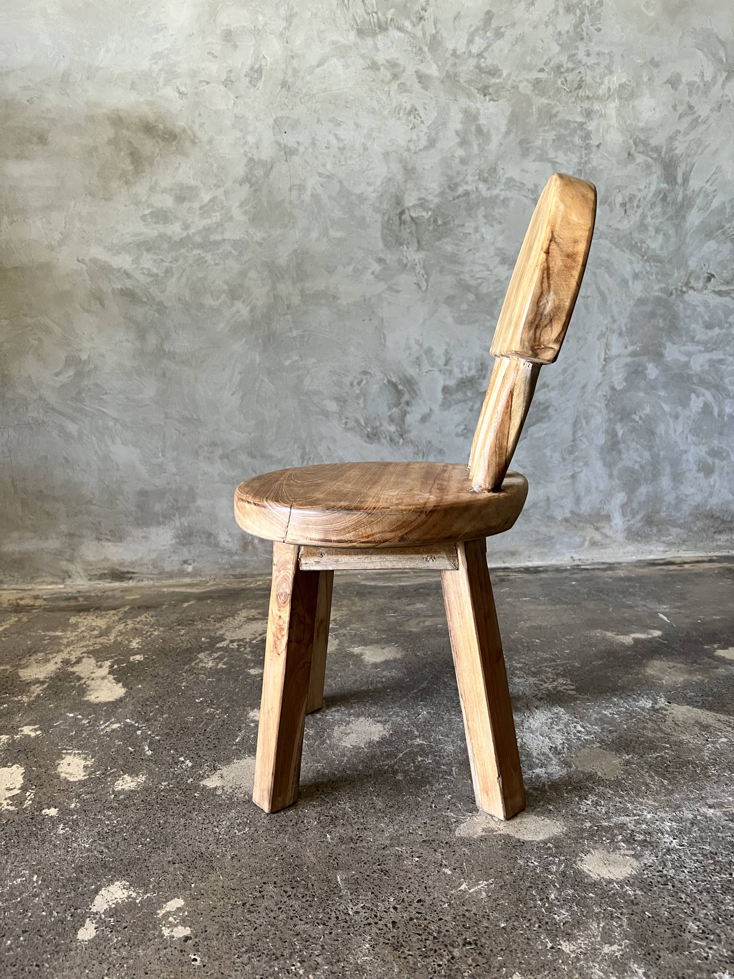 Small child's chair in natural blond teak back with three bars
