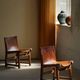 Paco Muñoz, Pair of lounge hunting armchairs, model "Riaza", leather and walnut, 1960