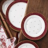 Suite de 10 assiettes à dessert et un plateau en porcelaine de Limoges, ETS Ternet