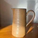 Vintage handmade earthenware pitcher