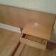 Bed with integrated bedside tables