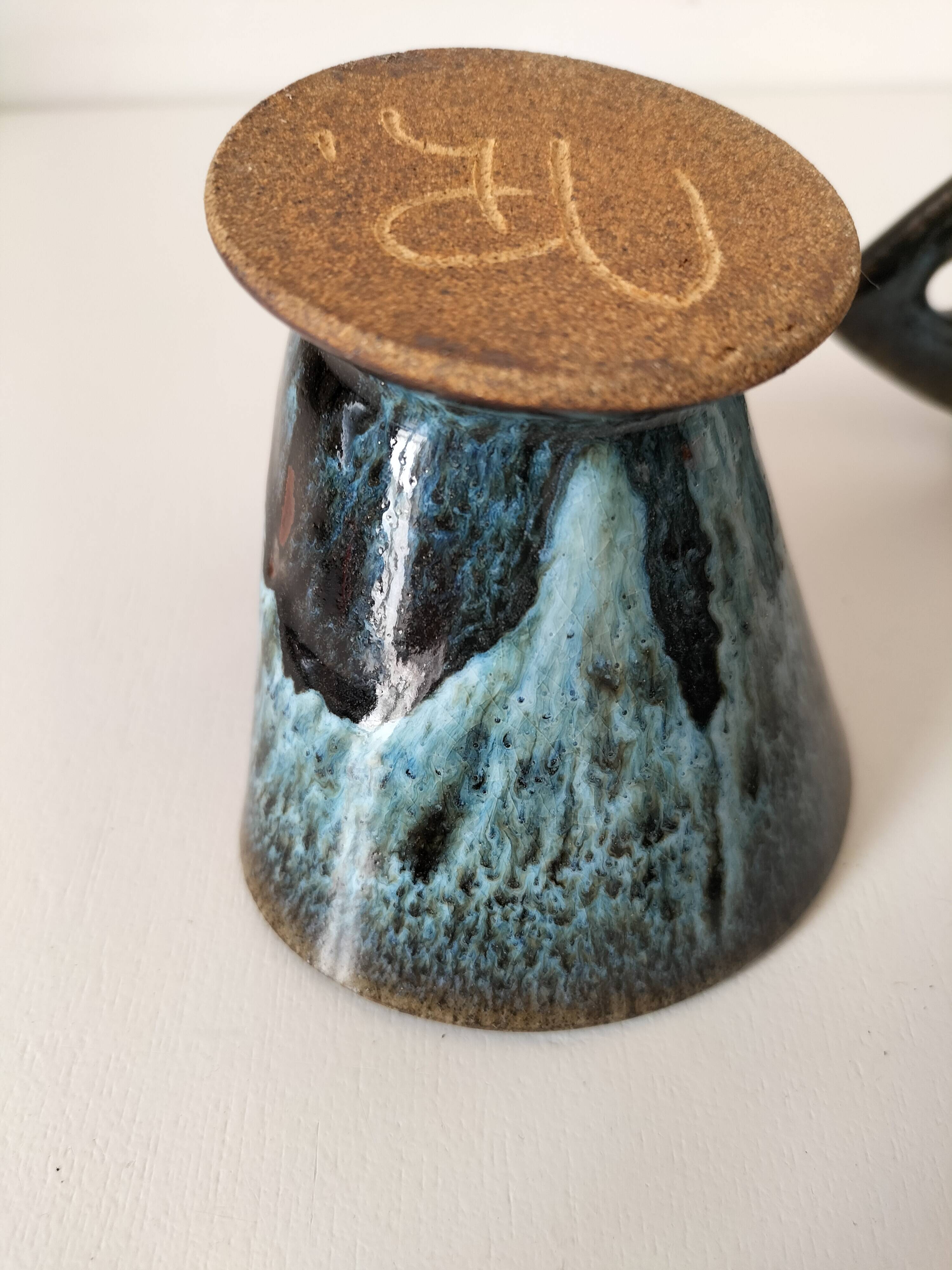 4 sculptural stoneware cups by Philippe Monroig