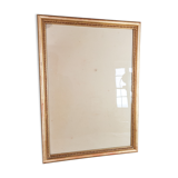 Old frame beaded decoration, gilded stucco wood