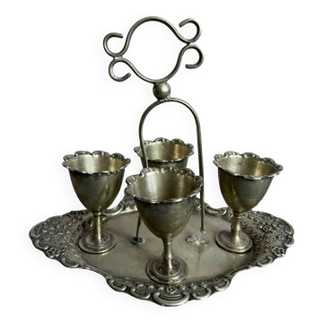 Antique egg set in nickel silver metal