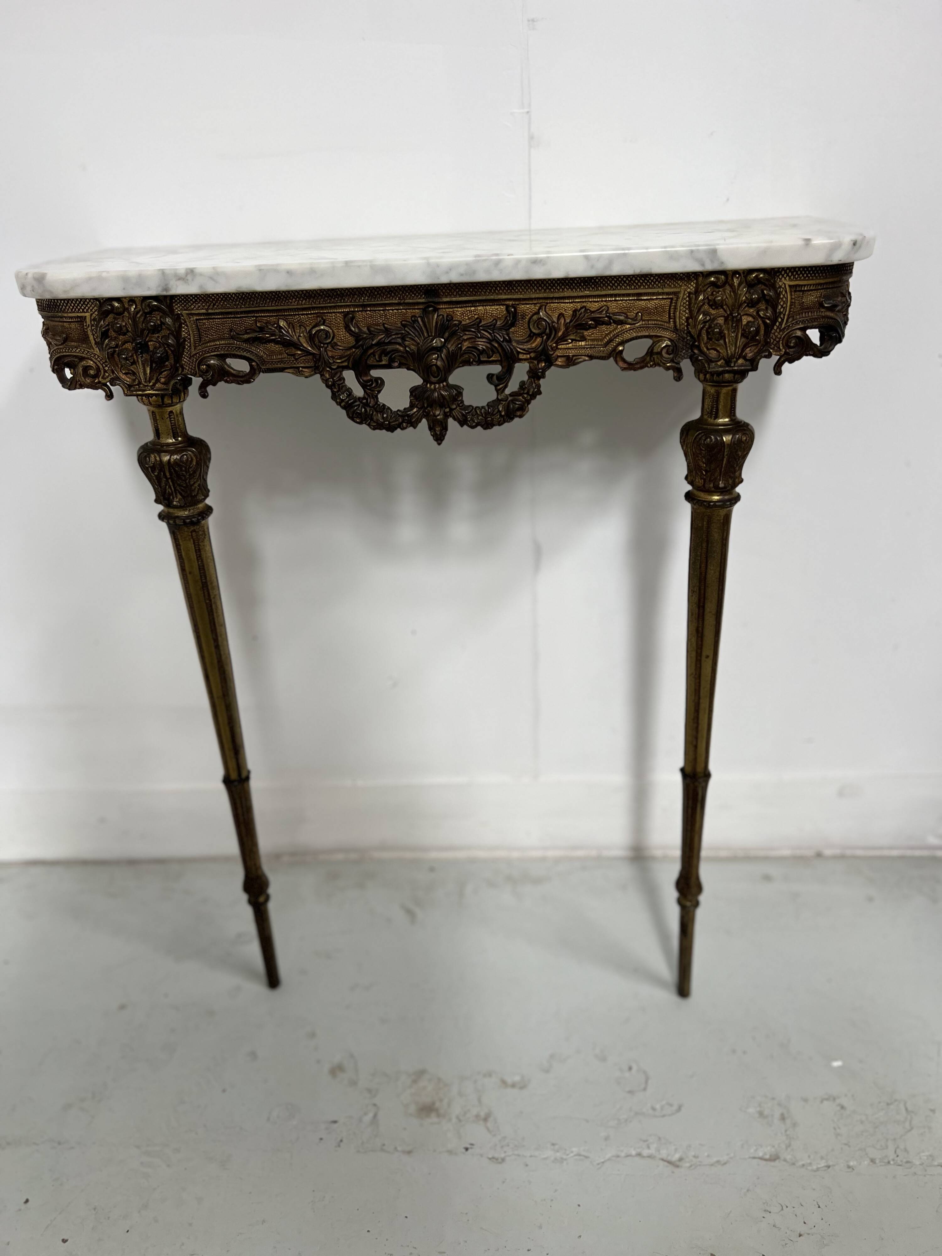Louis XVI style console in gilded bronze, 20th century