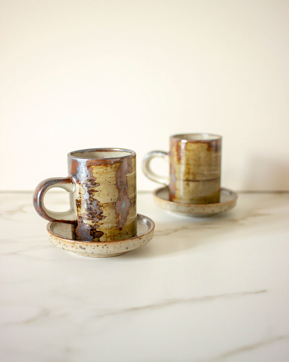 Pair of stoneware cups and sub-cups