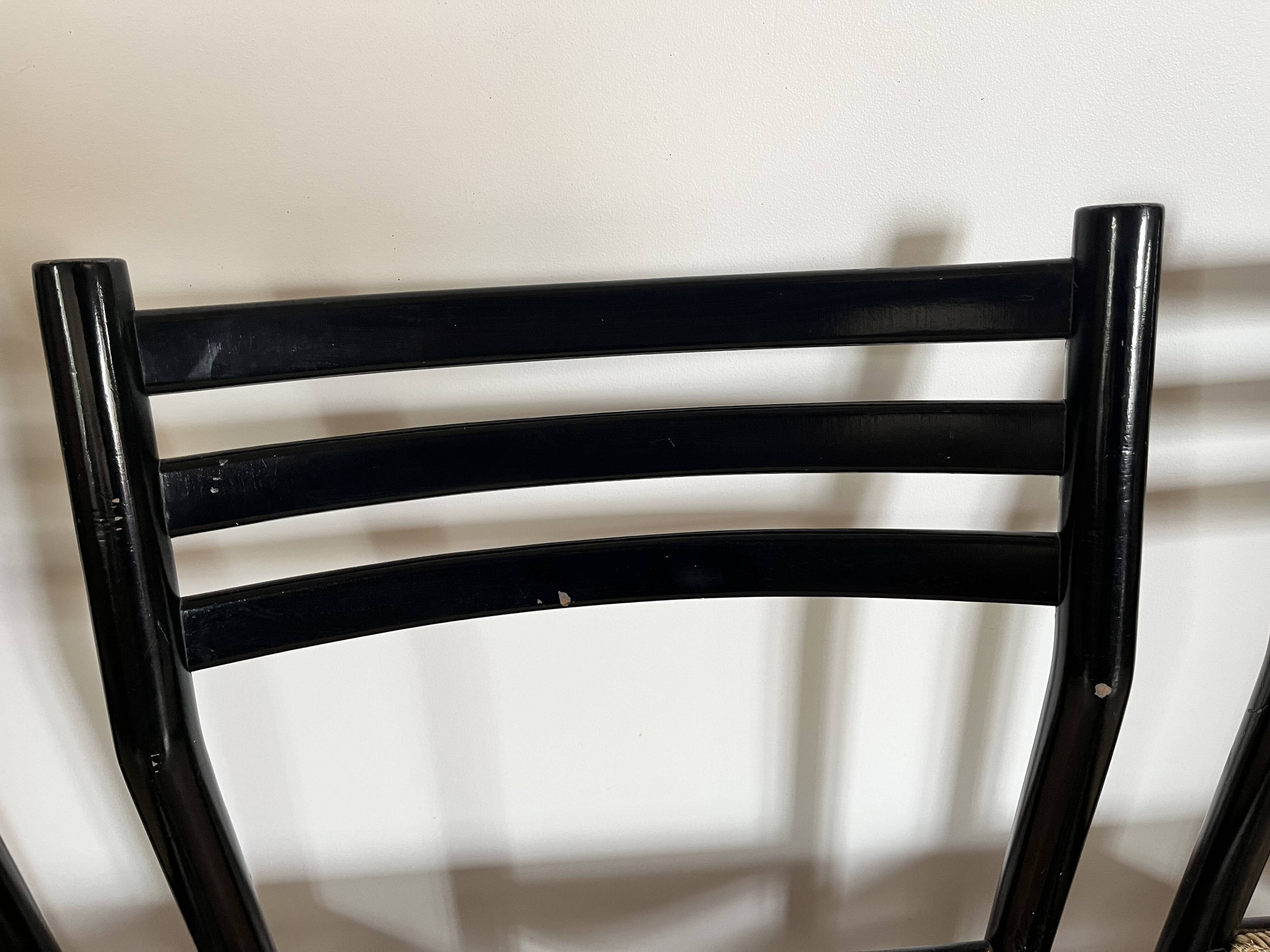 Set of 4 Italian black chairs 1970s