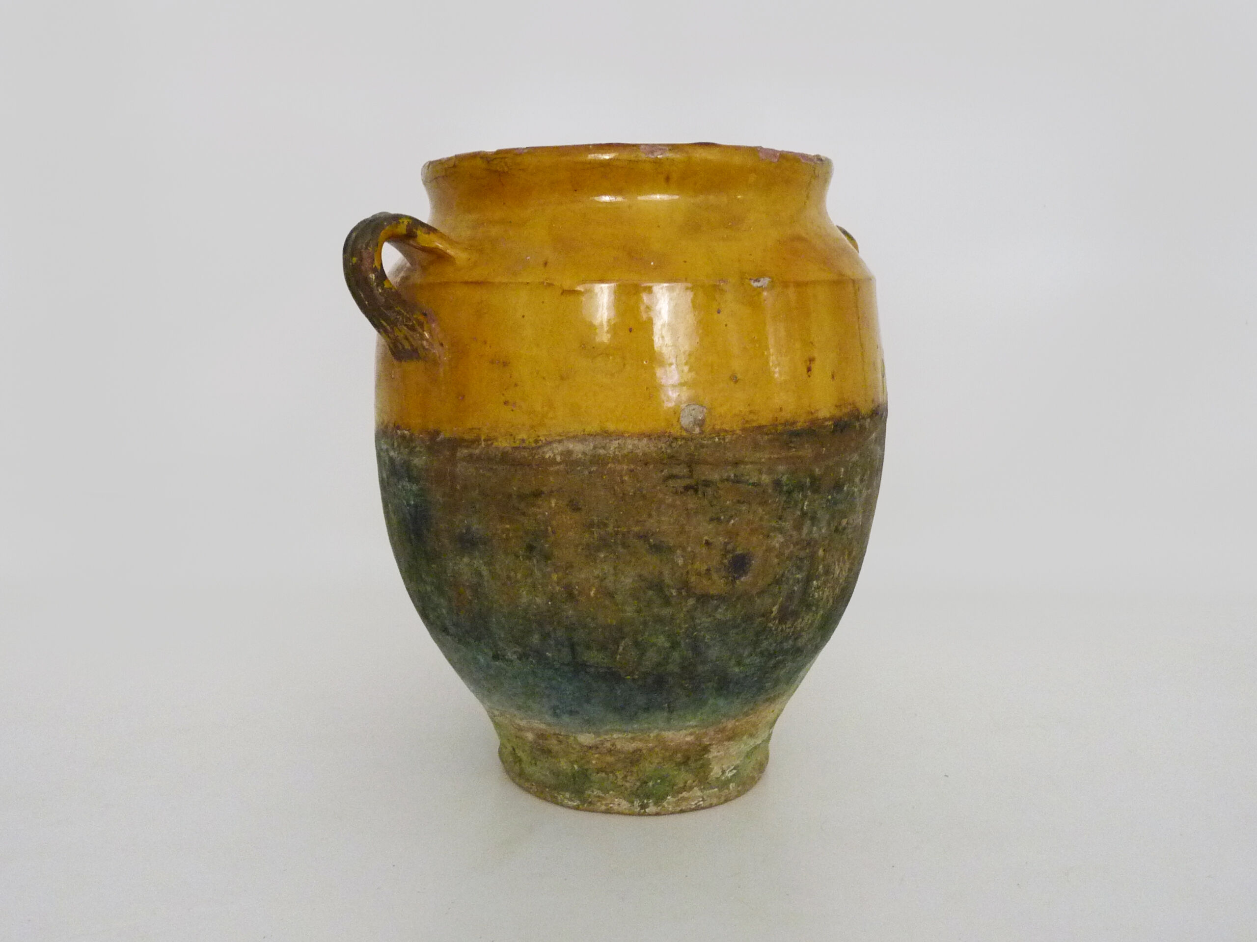 Magnificent glazed yellow confit pot, south-west of France. 19th century.