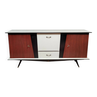 Atypically shaped sideboard in colored Formica, circa 1950
