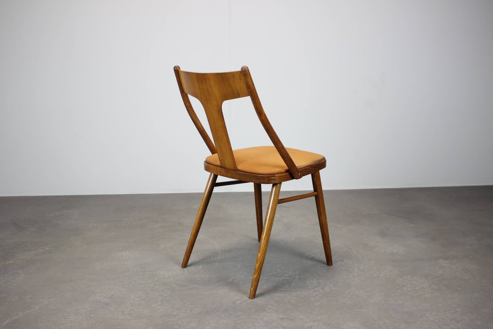 Set of four walnut dining chairs, Czechoslovakia, 1950s