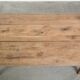 Antique pinewood coffee table with a drawer and a rural appearance