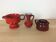 3 red ceramic vases