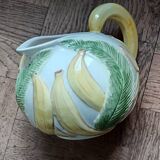 Jug in earthenware with banana decoration.