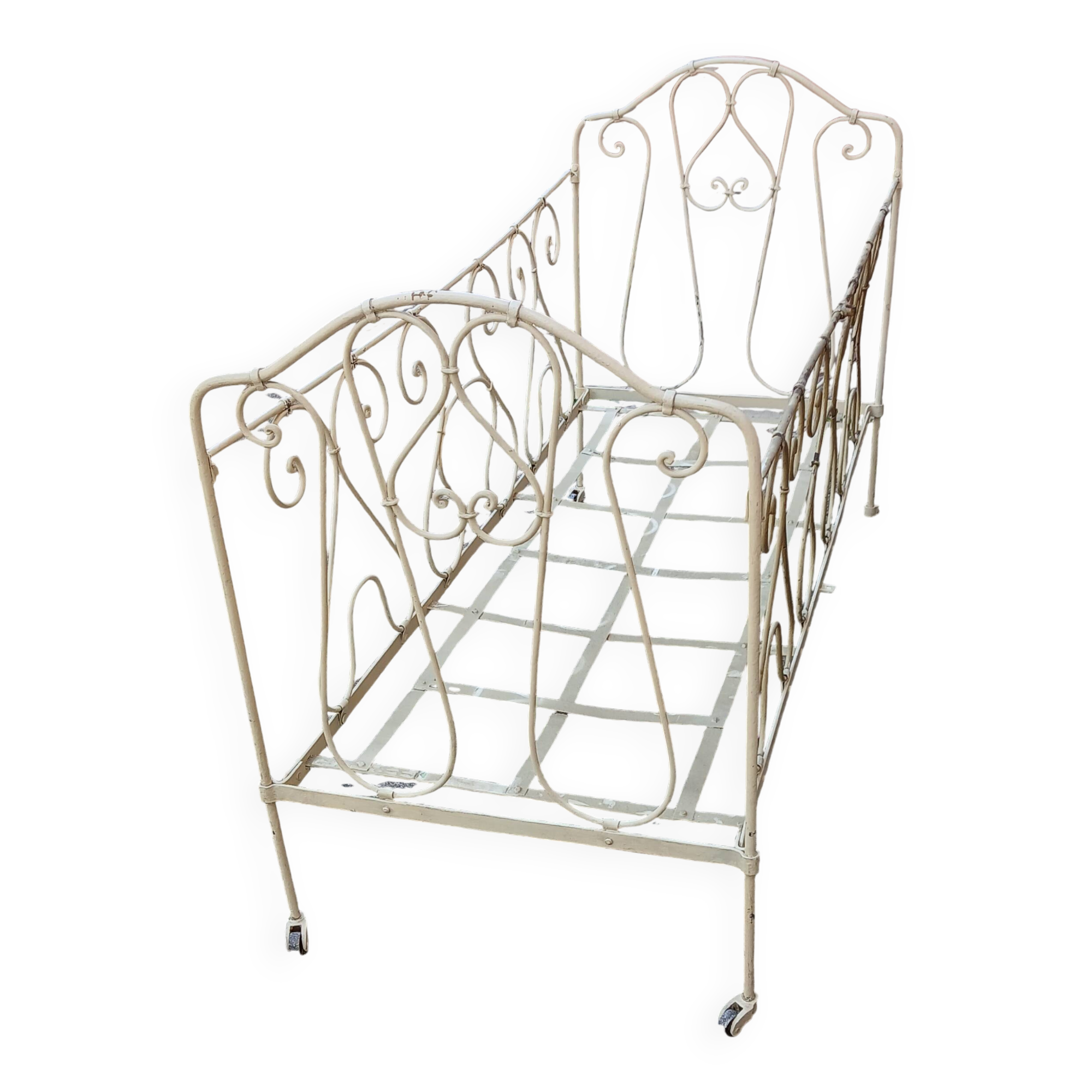 Magnificent bench/antique wrought iron bed.