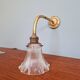 Bronze wall light with grooved clear glass, early 20th century