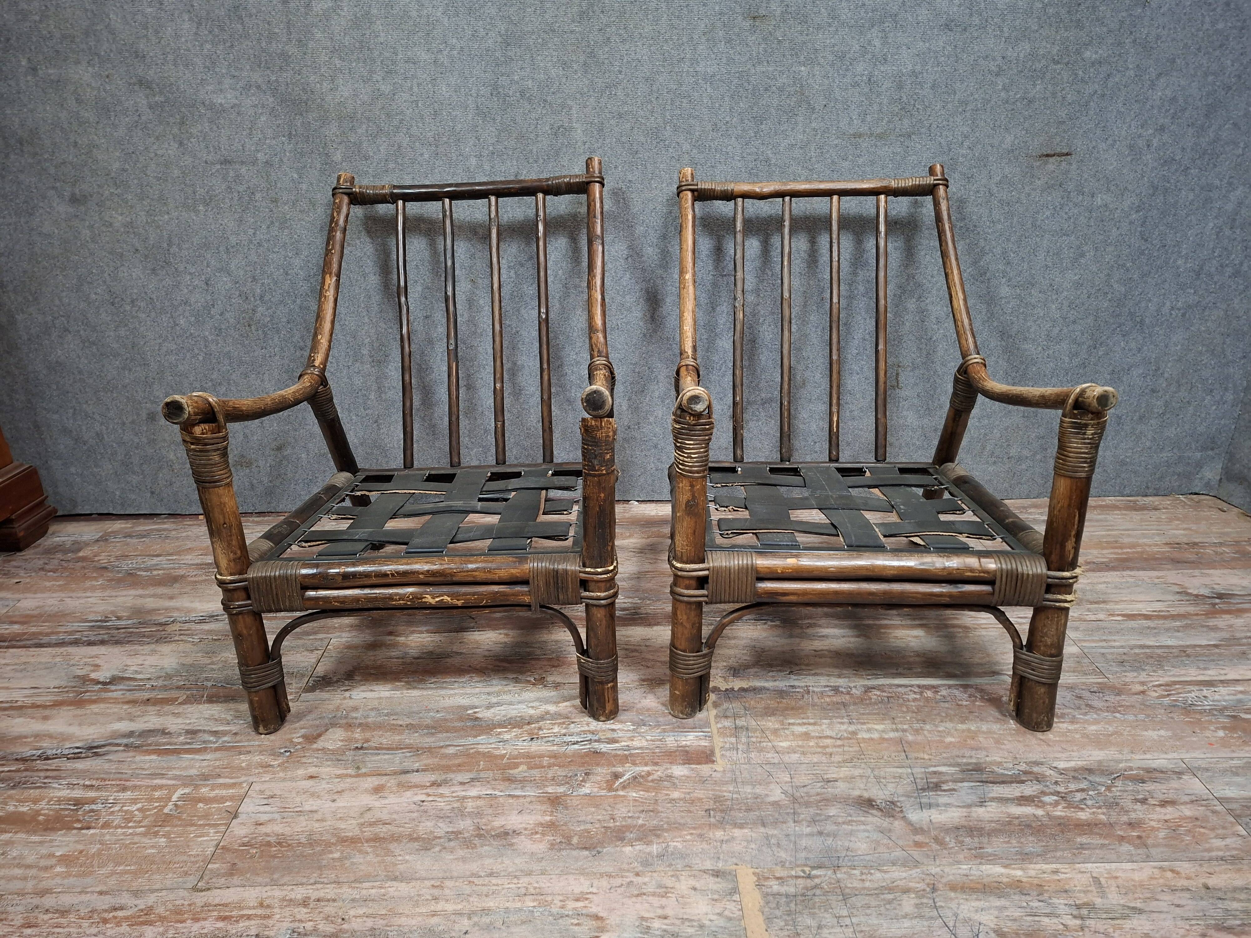 Pair of low bamboo armchairs with an exotic spirit, dating from the early 20th century.