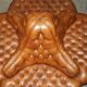 Heritage leather Chesterfield sofa, four-seater, Tête-à-Tête model.