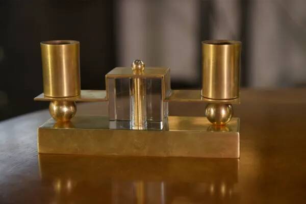 Pair of brass and Bohemian crystal wall lights in the style of Jean Royère, 1940s