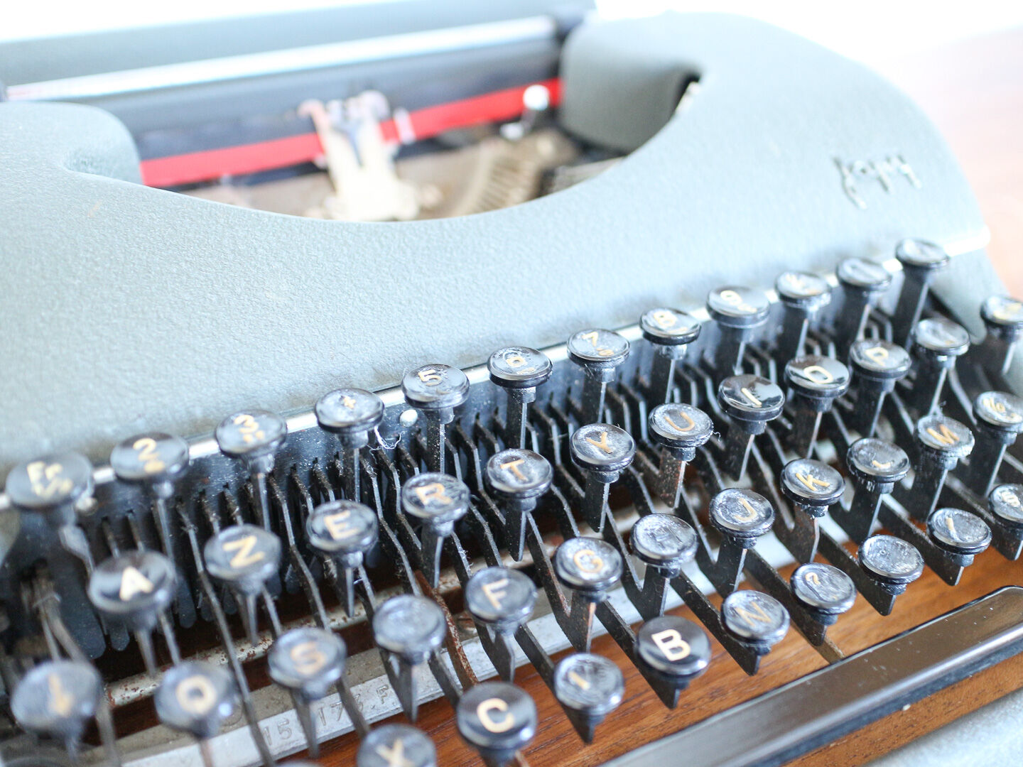 Japy grey-green typewriter with crate