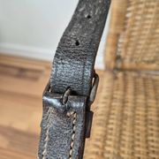 Vintage foldable beach chair, picnic in rattan and leather.